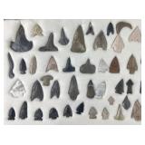 Collection of Native American arrowheads and