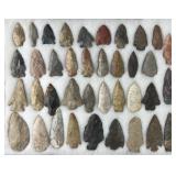 Collection of Native American arrowheads in