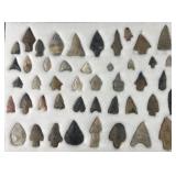 Collection of Native American arrowheads and