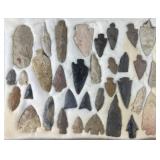 Collection of Native American arrowheads in