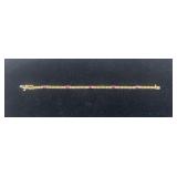 10K Gold and Ruby bracelet, marked ï¿½10Kï¿½, 3.60