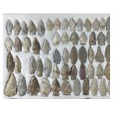 Collection of Native American arrowheads in