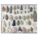 Collection of Native American arrowheads in