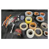 Tape, Milwaukee Tape Measurer and pens and
