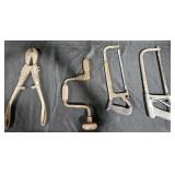 Bolt cutters, hand brace and saws