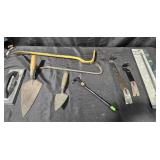 Basin wrench, pry bars, trowels, grout floater