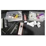 Plumbing supplies: PVC parts, drain pop up, basin