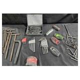Hex Keys different sizes and Milwaukee Tape