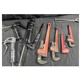 Grease guns and Pipe wrenches. Craftsman