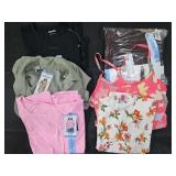 Women's size Large dresses and shirts. Most New