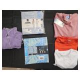 Women's size Large shirts and pajama sets. Most