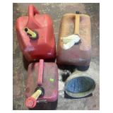 3 gas cans and a funnel