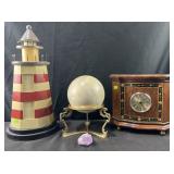 Group of decorative accessories, stone sphere on