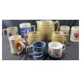 Group of steins, mugs and Uhl pitcher