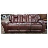 Dual Reclining Sofa. Brown faux leather. Not