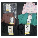 Women's size Medium shorts and leggings. New w/