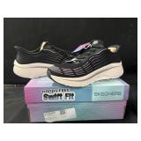 brand new Size 10 adult sketcher shoes, hands