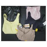 Women's size Medium dresses and shirt. Most New