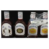 2 40oz. Sweet baby rays honey BBQ sauce bottles.