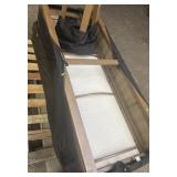 set of two padded lounge chairs with side table