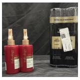 Two 8FL oz bottles of densifying leave in spray.
