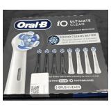 Oral-B ultimate tooth brush with 8 brush heads.