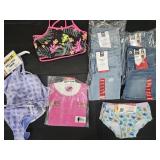Girl's size 7/8 bathing suit, shirts, pants and
