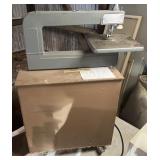 Jigsaw mounted on mobile cabinet, 41' x 22' x 58'