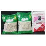 2 10lb bags pure cane sugar. 7lbs powdered sugar