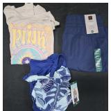 Women's size 3XL bathing suit, shirt and pants.