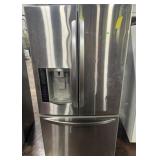 Used-LG French door refrigerator & freezer,