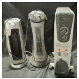 2 oscillating digital tower space heater.