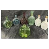 Group of vintage decanters and bottle