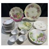 Group of decorated porcelain plates & charger