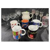 Group of decorated glassware, mugs, pitcher &