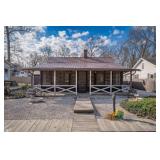 UNIQUE LOG CABIN HOME ON .23 AC LOT