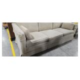 Three Cushion Upholsted Sofa