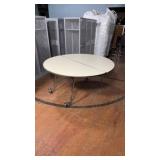 ROUND FOLDING TABLE ON WHEELS