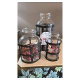 Three Glass Vases With Metal Strapping