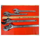 Four Adjustable Wrenches, 18' and 24'