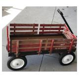 Wagon with red wooden rails