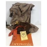 Early Brownie Girl Scout uniform and handbook