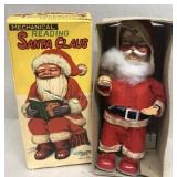 Mechanical reading Santa Claus