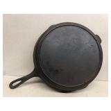 Cast iron skillet 12 with a heat ring sits flat