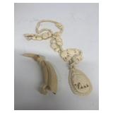 Ivory elephant necklace and bird