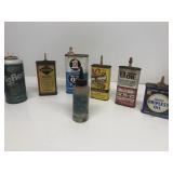 Advertising cans penetrating oil, liquid wrench,