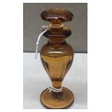 Amber glass perfume bottle
