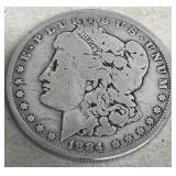 1884 O Morgan silver dollar