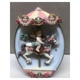 Angel riding carousel horse wall hanging