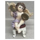 Angel playing symbol